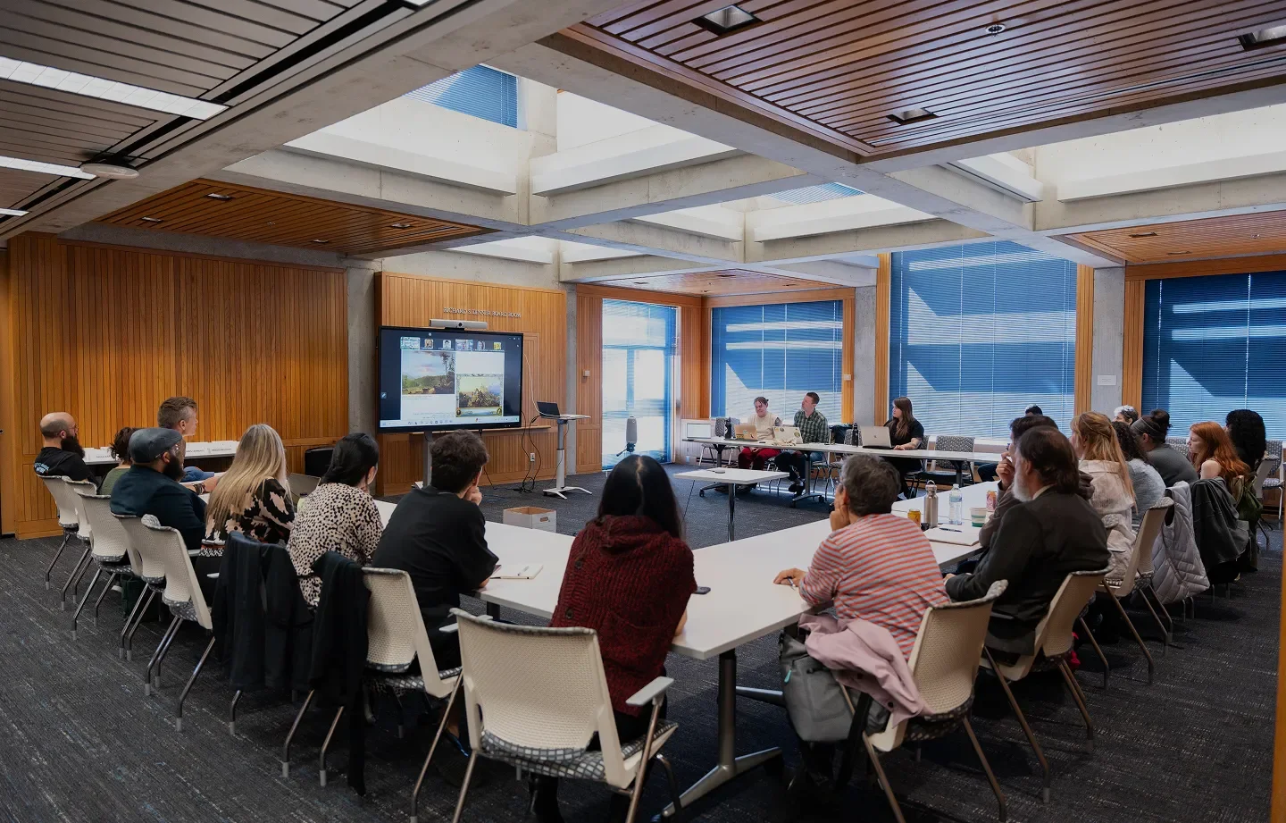 A group of students in a conference room